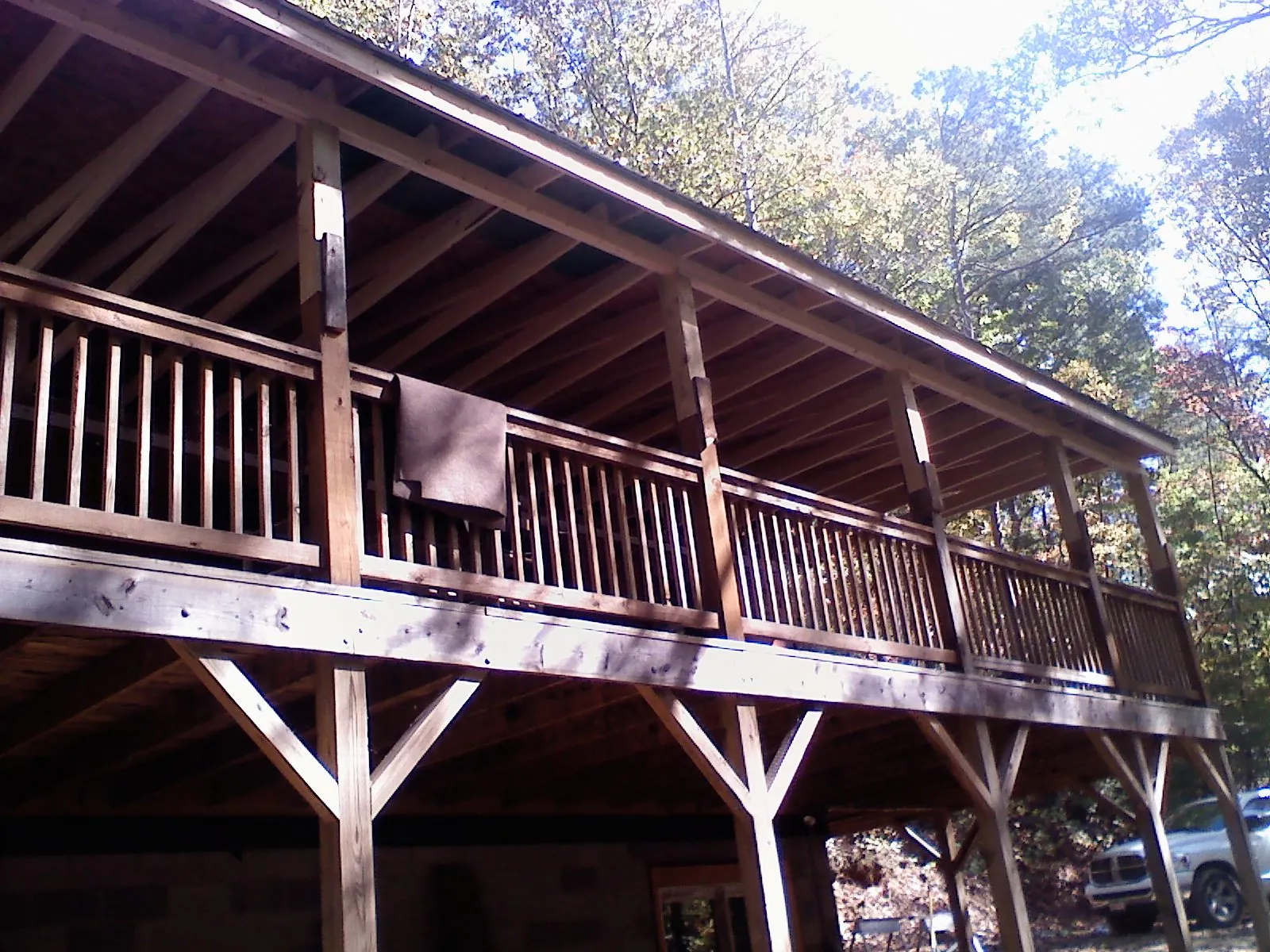 Timber framing under a new elevated porch and deck — Roof Leak Repair in Battle Lake by Roofing Brothers